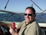 Captain Charly says "This boat ride is sponsored by Coca Cola".