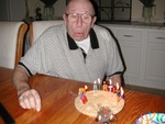 "Happy Birthday toooooo youuuuu -- and many more!"  Gramps blows out the cool "letter" candles...