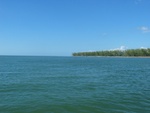 After swimming in, getting some take-out, swimming back out to the boat, and having lunch...  We then traveled out in the Gulf of Mexico and up to Sanibel Island.  This view is looking north at the northern tip of Sanibel Island from the Gulf of Mexico.