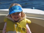 As mom and Paige were digging around in the front of the boat they found this hat (we think it might be Rachel Cossin's - Thanks Rachel!)  Paige decided she'd wear it to keep her hair out of her eyes, and block the sun...