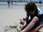 Tom's working on a sandcastle...