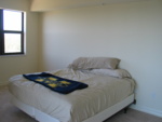 As you can see the master suite has the 'bare' essentials...  Bed, sheets, and University of Michigan blanket. :)