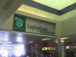 This photo was taken on my way back from my bro's graduation at the Atlanta Hartsfield airport "LaptopLane, Peace, Quiet and T1 Line!"