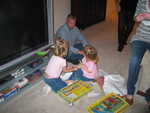 After dinner, and listening to Jesse jam, we started the gift exchange.  Paige & Josie opened their gifts...