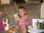 Before Melanie left to go up to Ohio for Christmas, we opened gifts at the condo!  Josie is intrigued with her I-Spy Cards!