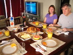 Here we are Christmas Morning - Dad & Kim made breakfast for us!  Tasty!  Eggs, French Toast, Potatoes, Grapefruit, Oranges (Thanks to Mel!) & Bacon!  Yummy!