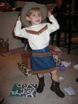 Here's Josie showing off her Cowgirl outfit too!  She put her leg like that all on her own?!?!