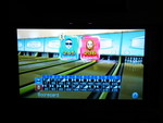 After having fun on the beach, we went back and played the Wii!  Lucy & I battled in bowling, and I barely won, but check  out the amount of strikes we got!  Wow!  (She totally beat me in Tennis - I need more practice!)