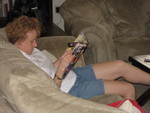 Deb enjoying her vacation...  Catching up on some reading.