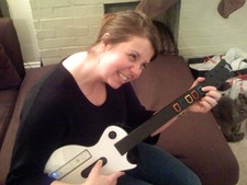 Here we are New Years Eve -- Chris is rocking out to Guitar Hero 3!  She was awesome!