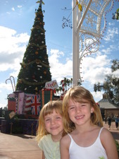 As we walked to the World Showcase -- we stopped for a photo op by the Epcot Christmas tree!   (For the northerners -- yes, light shirts & shorts -- it was 82'!)