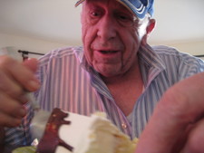 Gramps is enjoying some of the cake!  