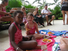 Paige and her friends enjoy the pizza & goodies.