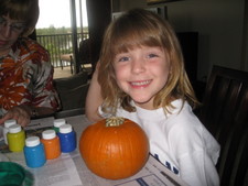 Josie picked one of the small pumpkins!