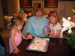 Paige & Josie help Gramma put the Jelly Beans on the bunny.