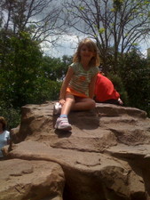 For the Flower festival at Epcot they setup a playground.  Here's Paige up on the rocks!